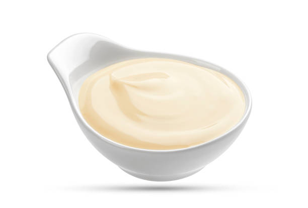 istock Mayonnaise sauce bowl isolated on white background 637594342