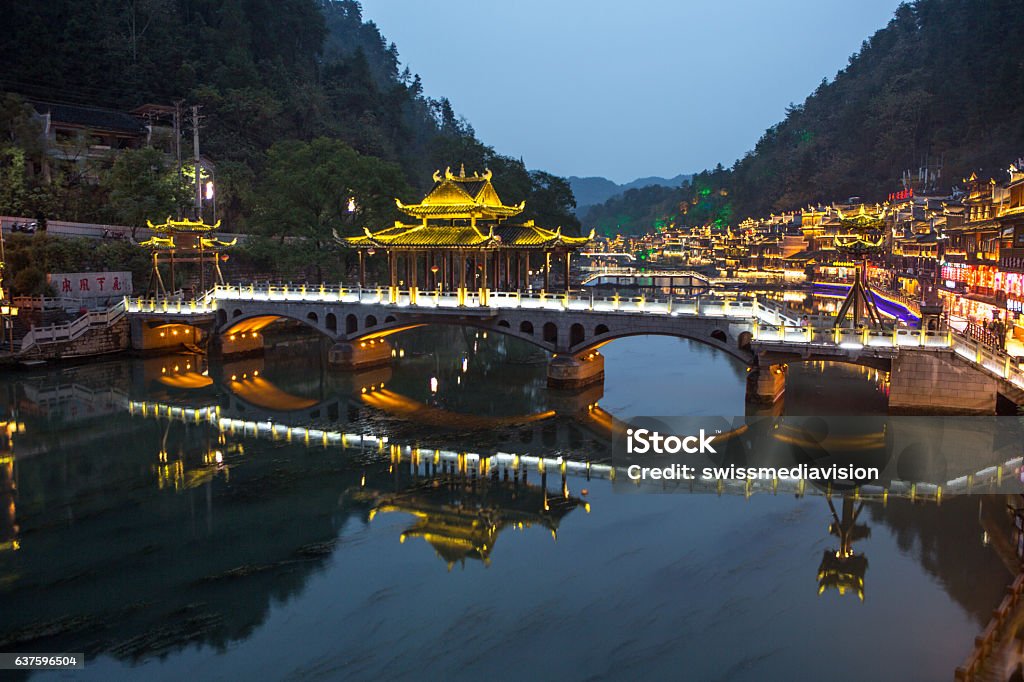 Fenghuang County at night, Hunan, China Fenghuang County at night with street lights. Ancient Stock Photo