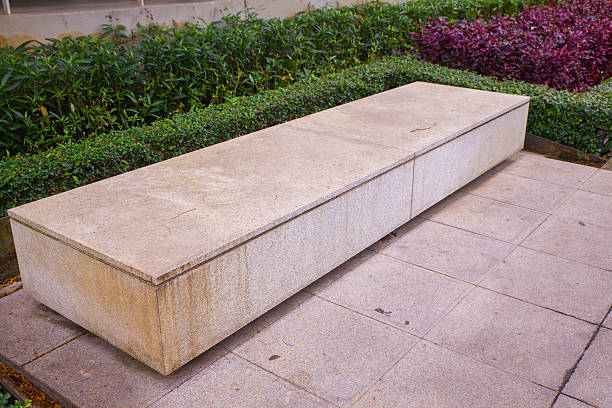 istock modern concrete bench in the garden 637599258