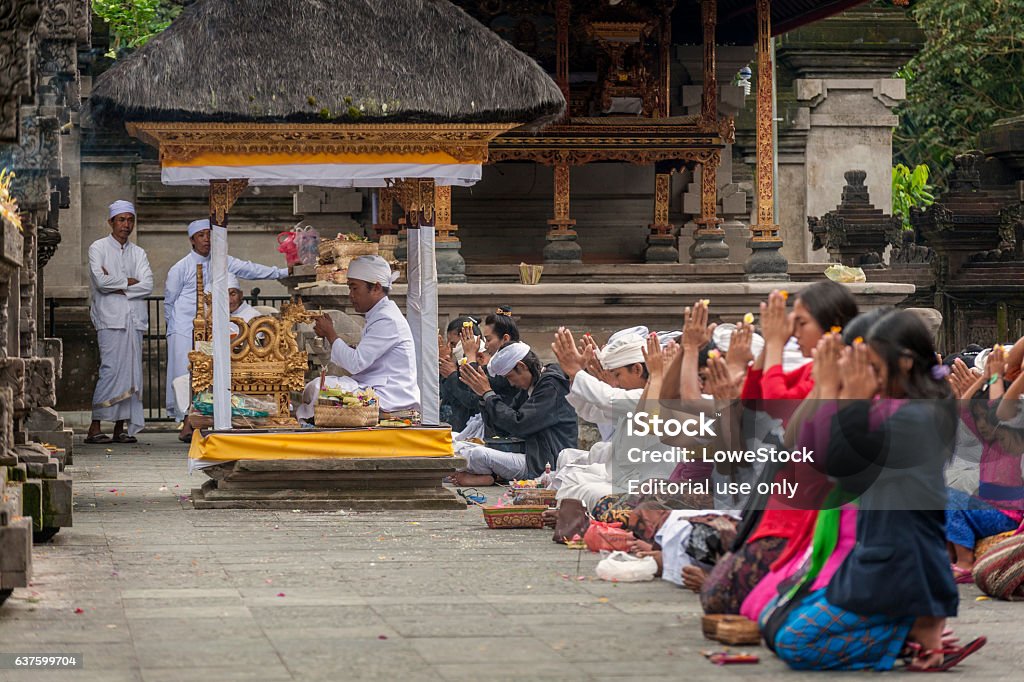 Balinese Hindu Temple Tirta Empul, Bali, Indonesia Ubud, Bali, Indonesia - November 14, 2016: This temple compound consists of a petirtaan or bathing structure, famous for its holy spring water, where Balinese Hindus go to for ritual purification. Asia Stock Photo