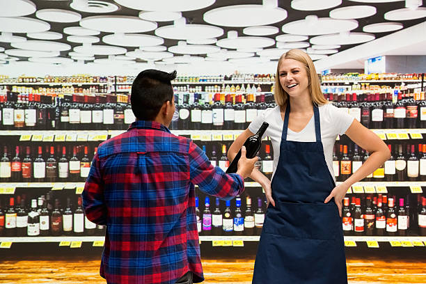 istock Customer buying alcohol from supermarket 637600012