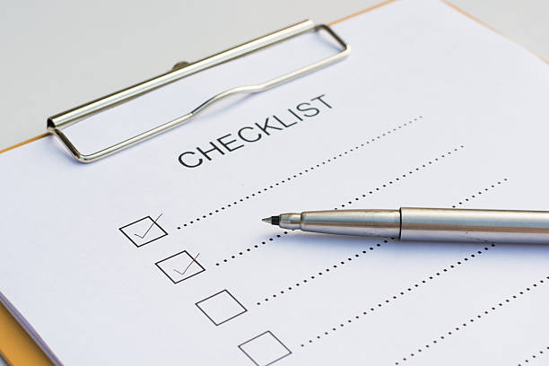 istock Checklist concept - checklist, paper and a pen 637601924