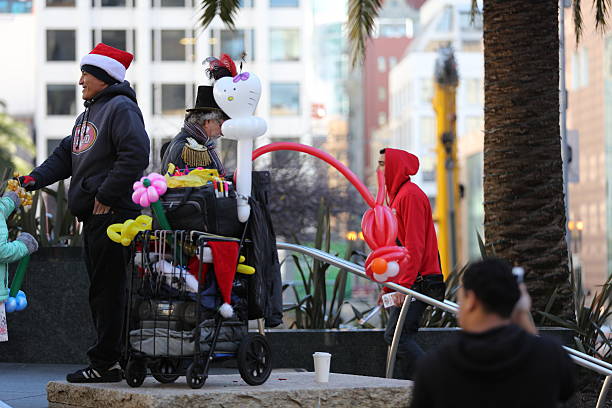 San Francisco, CA, USA - December 24, 2016: Tourists and vendors are at the union square during the holiday.