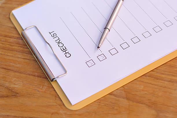 istock Checklist concept - checklist, paper and a pen 637602790