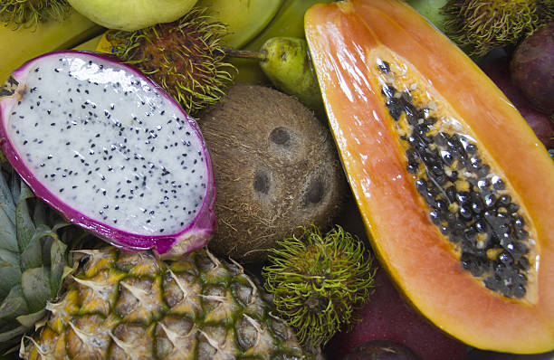 fond de fruits - fruits exotique diversité photos et images de collection