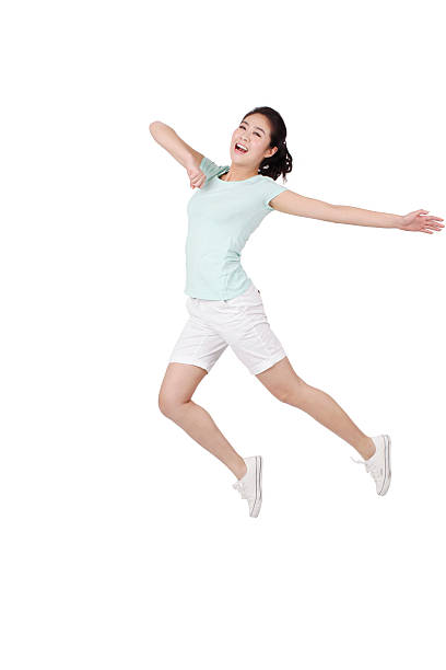 istock Young woman jumping 637603420