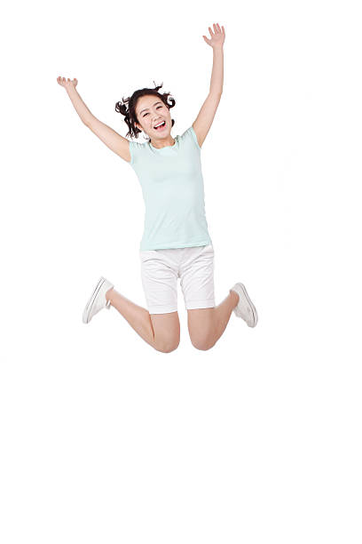 istock Young woman jumping 637603432