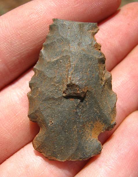 istock Close-Up of Prehistoric Native American Arrowhead 637608190