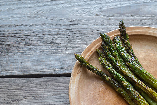 istock Roasted asparagus on the plate 637608440