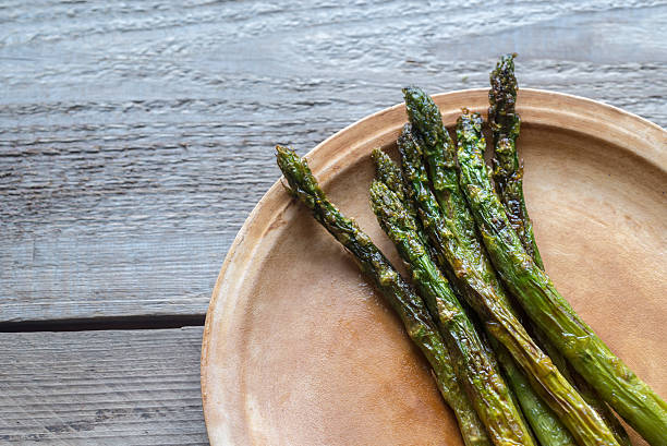 istock Roasted asparagus on the plate 637610762