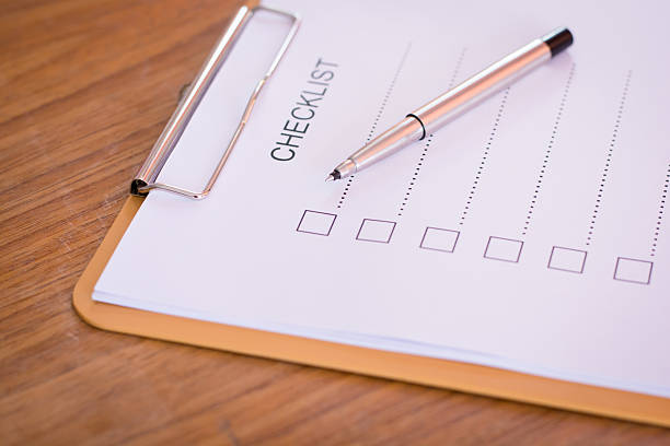 istock Checklist concept - checklist, paper and a pen 637611414
