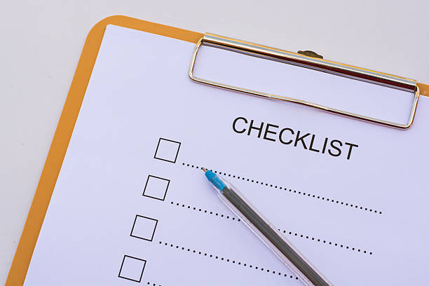 istock Checklist concept - checklist, paper and a pen 637612064