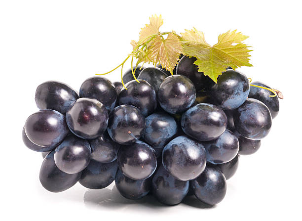 istock bunch of blue grapes with leaf isolated on white background 637614782