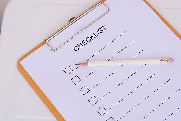 istock Checklist concept - checklist, paper and a pen 637615340