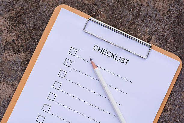 istock Checklist concept - checklist, paper and a pen 637615450