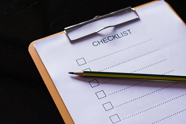 istock Checklist concept - checklist, paper and a pen 637616208