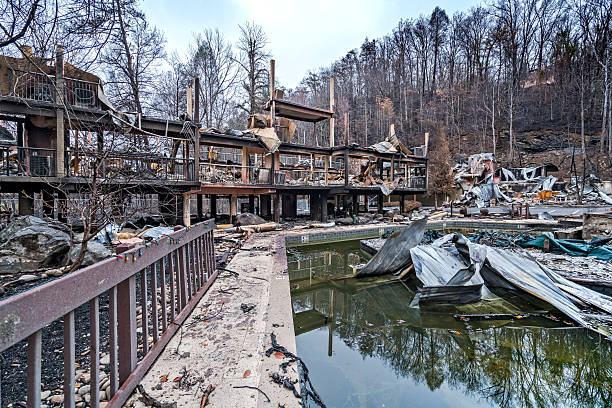 istock Burned motel or condominium after forest fires 637617292