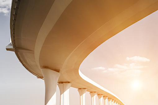 Underside of an elevated road with sun effect