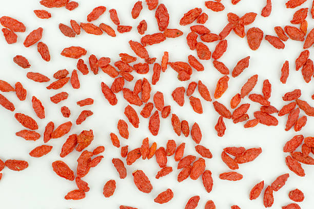 istock heap of goji berries isolated on white background 637619600
