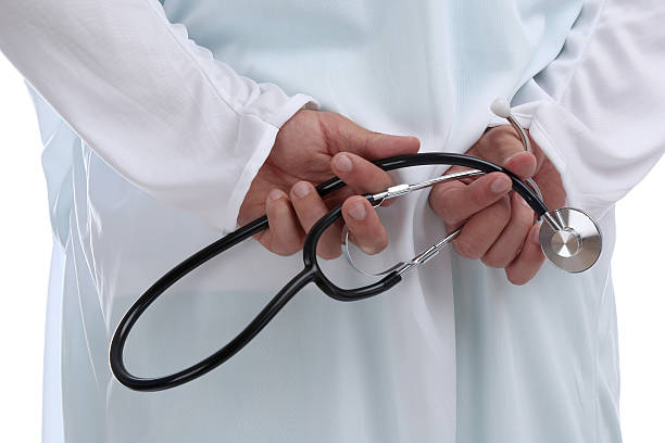 istock Doctor with stethoscope heart medical surgeon isolated 637619902