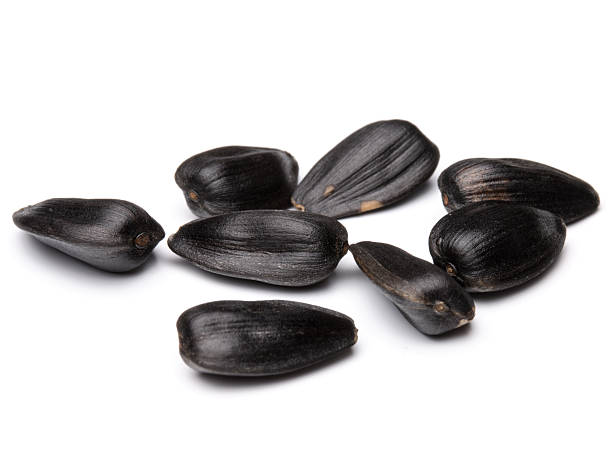 istock Sunflower seeds  isolated on white background close up 637620620