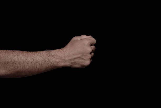istock Hand fist isolated on black background 637621356