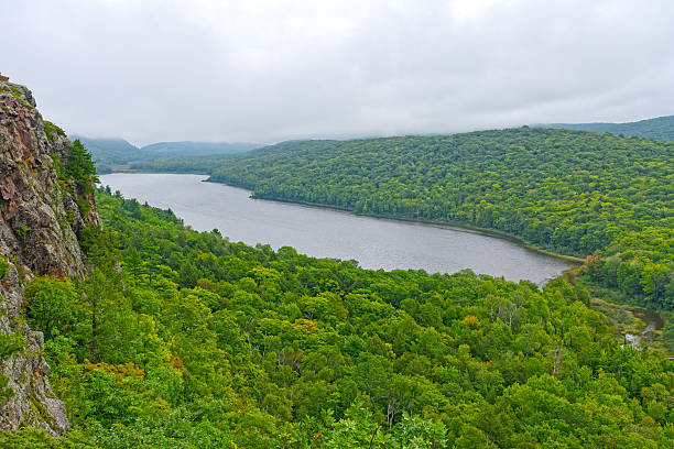 istock Foggy View of Remote Lake 637625120