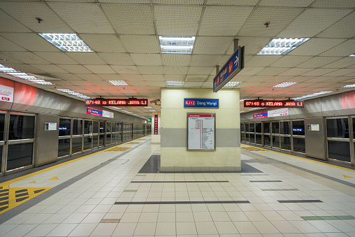 Kuala Lumpur, Malaysia - December 24, 2016. The public using a light rail transit (LRT) service in Kuala Lumpur