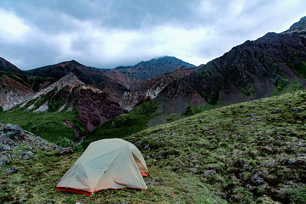 istock Green tent in the mountains 637628924