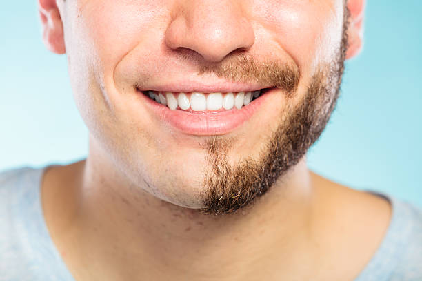 istock Happy man with half shaved face beard hair. 637639196