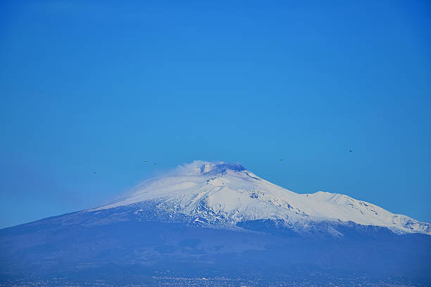 istock Mountain Etna top with snow 637640530