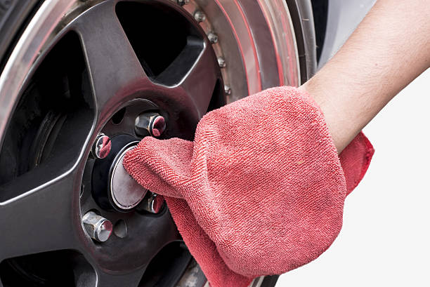 istock man cleaning car with microfiber cloth 637640784