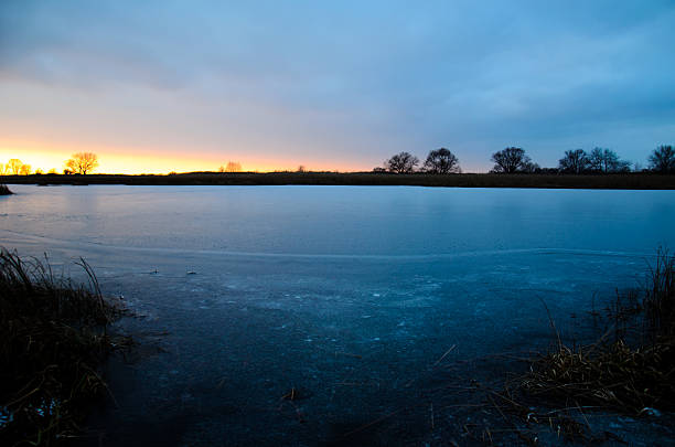 Beautiful winter sunset on a river Dnieper