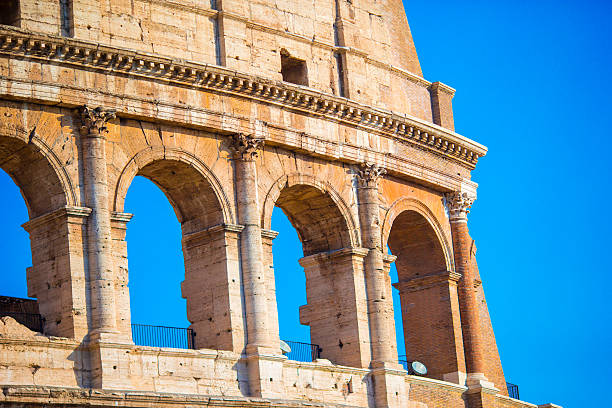 istock Colosseum or Coliseum background blue sky in Rome, Italy 637648802