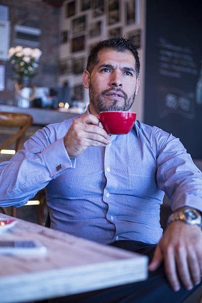istock Businessman in  cafe bar 637654324