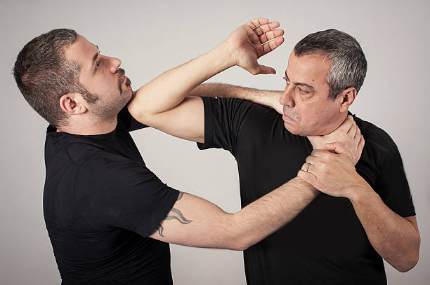 istock Street fighting self defense technique against holds and grabs 637654718