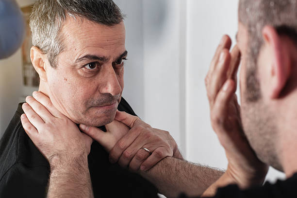 istock Street fighting self defense technique against holds and grabs 637656164