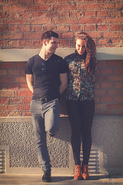 istock Couple posing in urban surroundings. 637657464