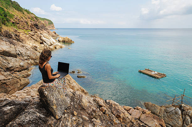 istock Woman freelancer feeling happy with laptop 637657640