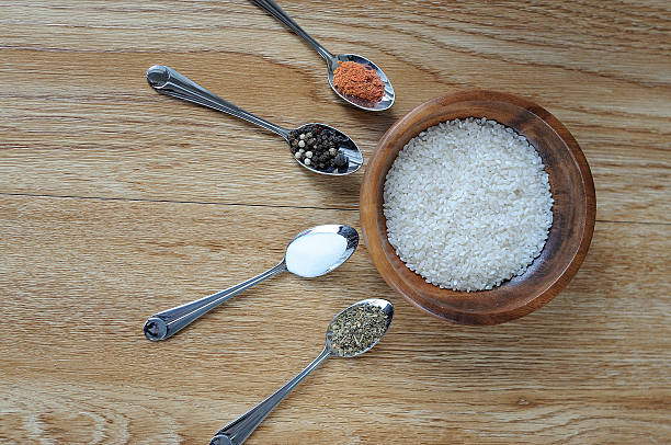 istock The rice and mix spices on wooden background 637660248