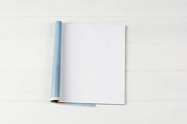 istock Mock-up magazines or catalog on wooden table background. 637664682