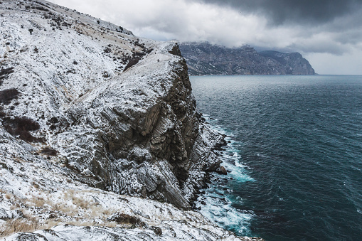 Winter sea landscape. View from the cliff of the coast in Balaklava, Crimea