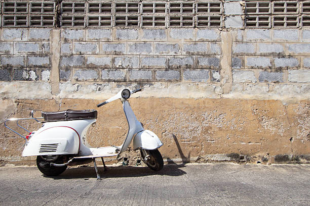 Vintage Red Italian Scooter in Old Sicilian Street