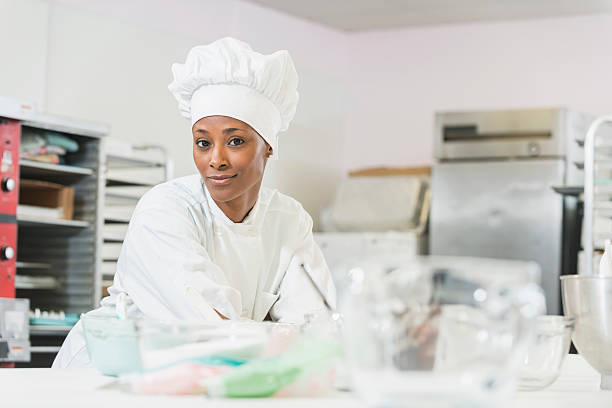 istock African American female chef in commercial kitchen 637671878
