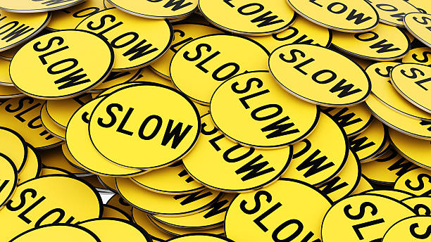 istock Pile of Bright Yellow Circular Slow Sign, Medium Shot 637677702