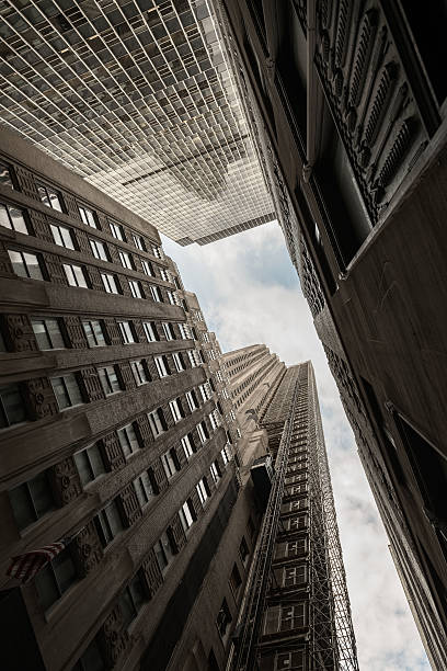 istock Looking up at skyscrapers in New York 637678446