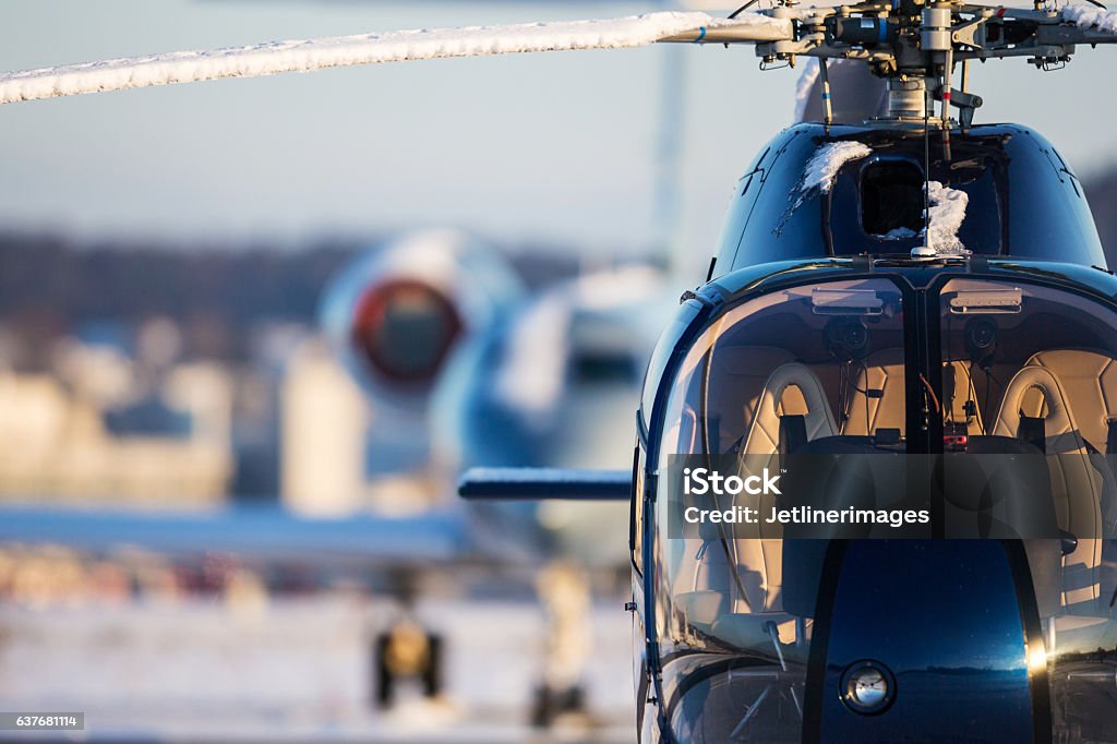 Helicopter and Business Jet Helicopter and Business Jet front view Helicopter Stock Photo