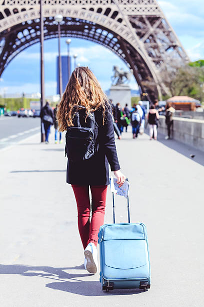 istock Pretty woman visiting The Eiffel Tower 637683772