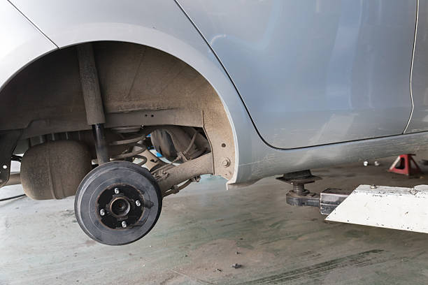 istock car in tire replacement service 637684226