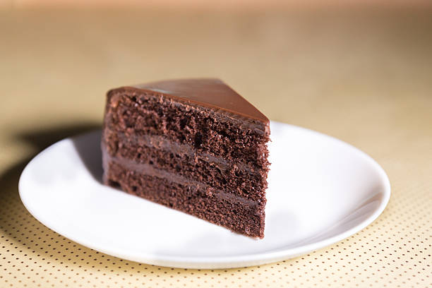 istock Delicious dark chocolate cake in white plate 637685630